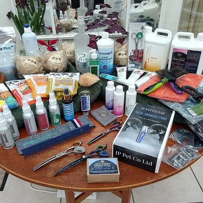 Kay9Cuts grooming tools and products laid out ready for a session